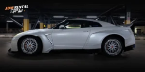 JDM Nissan Skyline GT-R driving on the Shuto Expressway in Tokyo at night